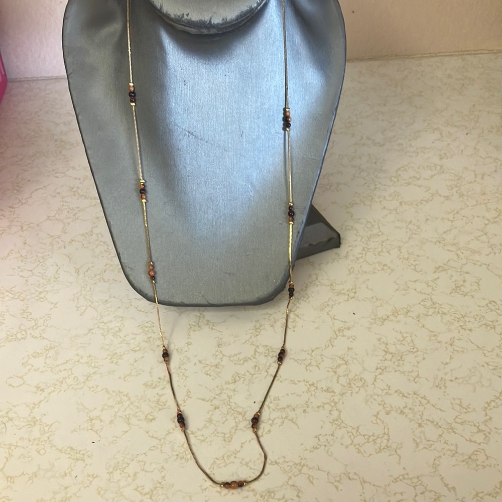 Elegant Gold and Brown Necklace